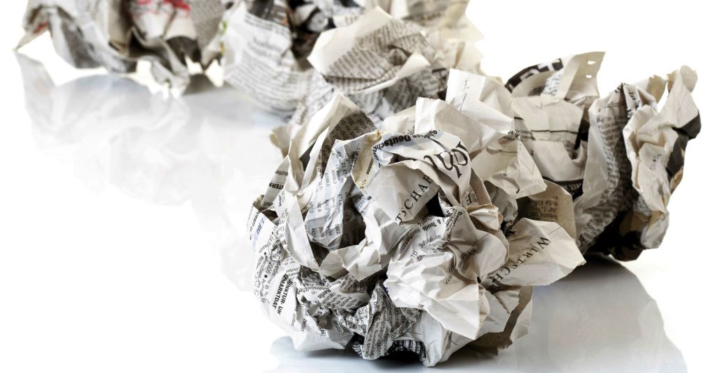 crumpled up newspaper